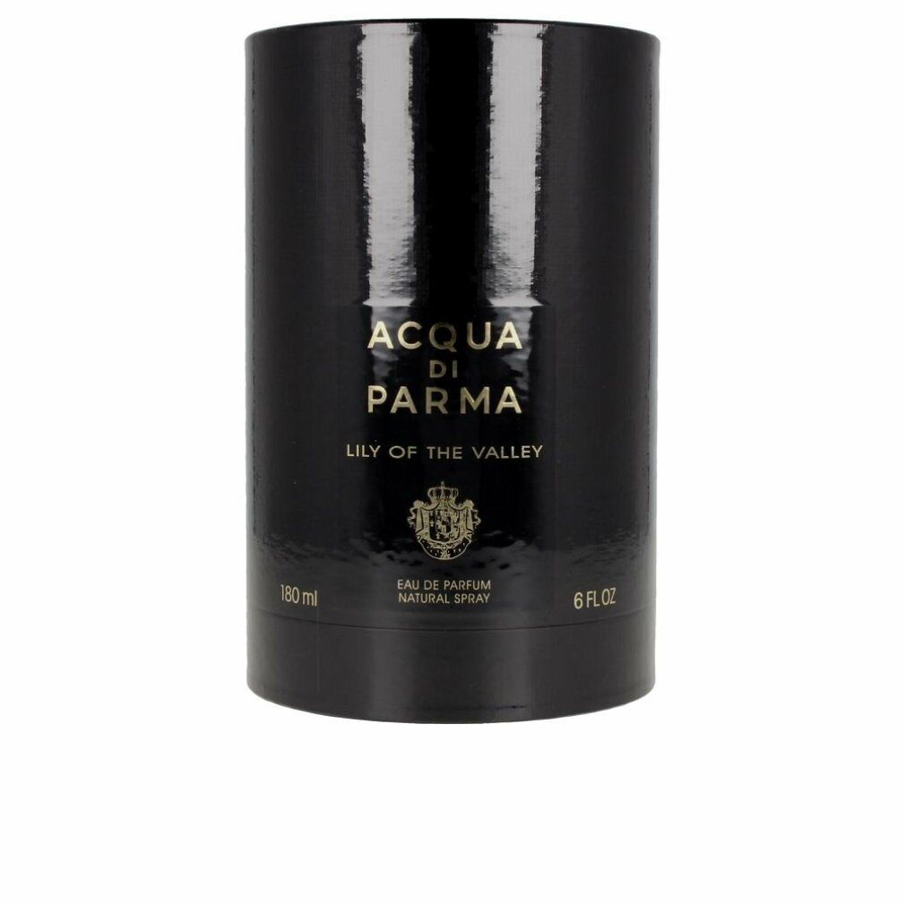 Zylindrische, schwarze Verpackung. Goldener Schriftzug: Acqua di Parma, Lily of the Valley. Unterhalb: Eau de Parfum Natural Spray, 180ml, 6 FL.OZ.
