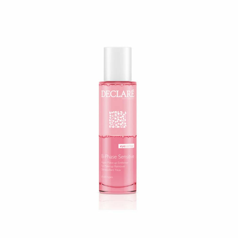 Detergente viso bifasico. Liquido rosa in flacone cilindrico con tappo bianco. Il marchio DECLARE è visibile.