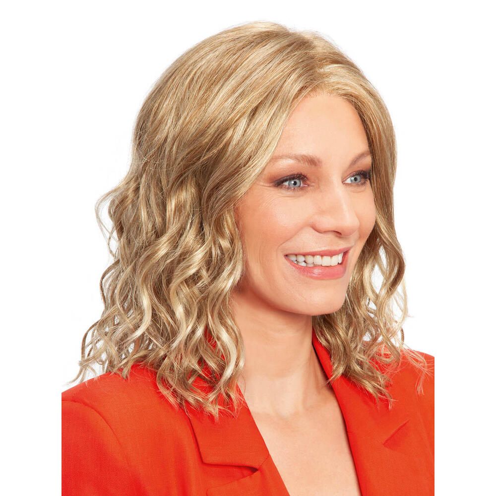 Blonde Perücke mit gewelltem Haar. Frau mit rotem Blazer. Frontansicht.