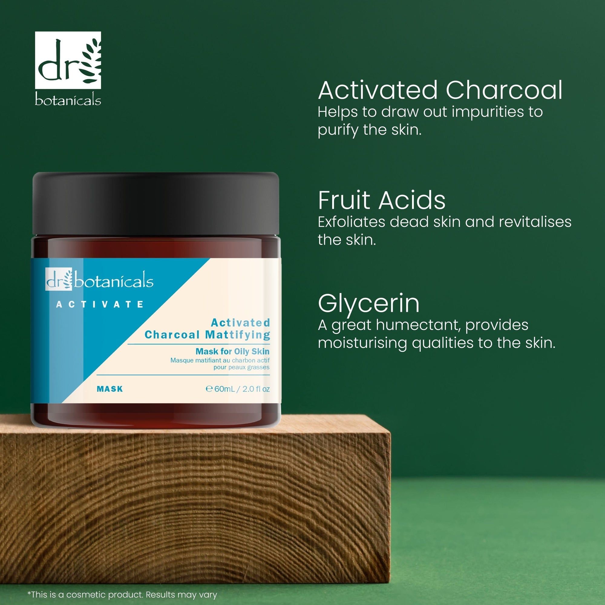 Braune Glasdose mit schwarzem Deckel auf Holzblock. Text: Activated Charcoal, Fruit Acids, Glycerin. Activated Charcoal Mattifying Mask.