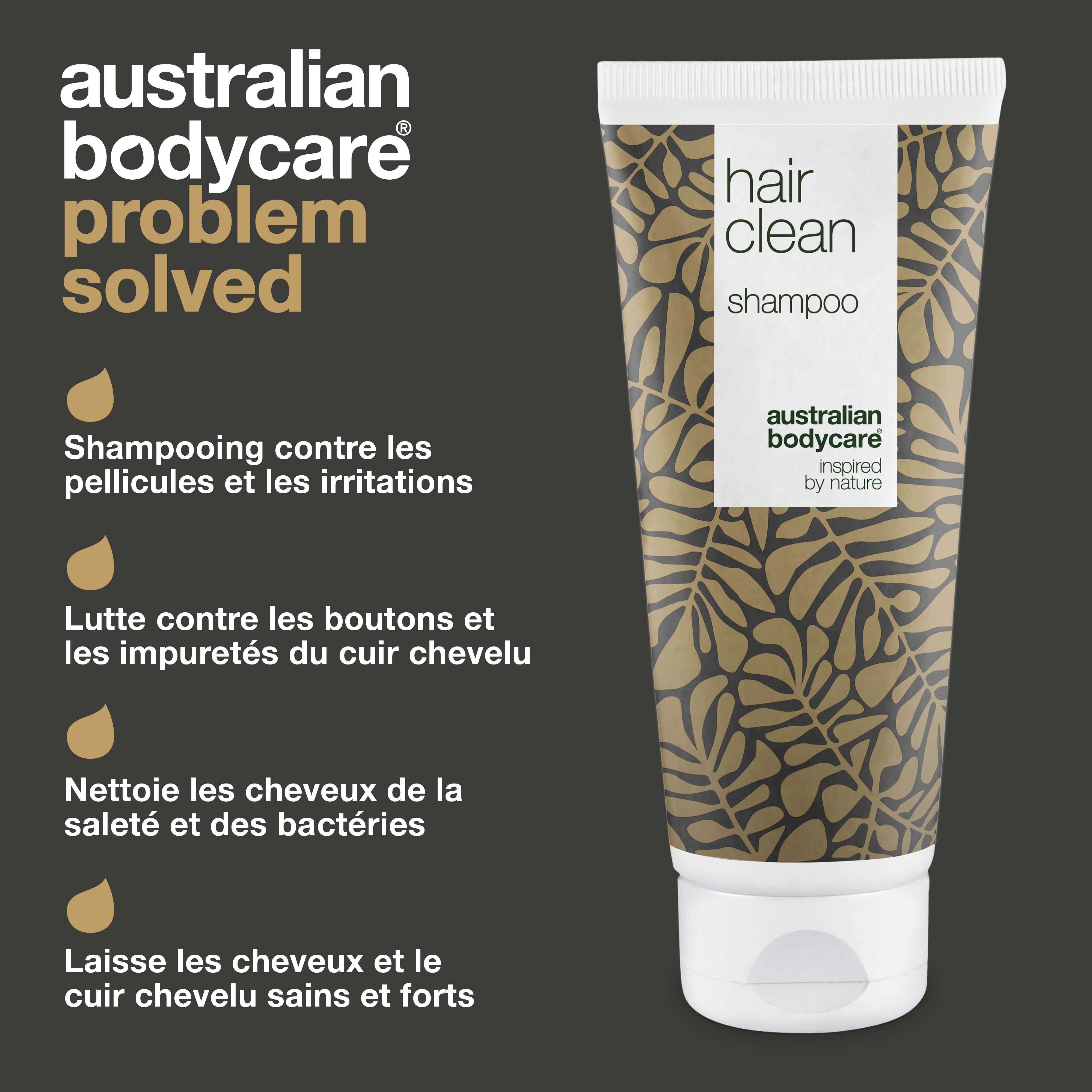 Tube de shampooing avec motif de feuilles et texte. Inscription : Hair Clean Shampoo, Australian Bodycare, Problem Solved.