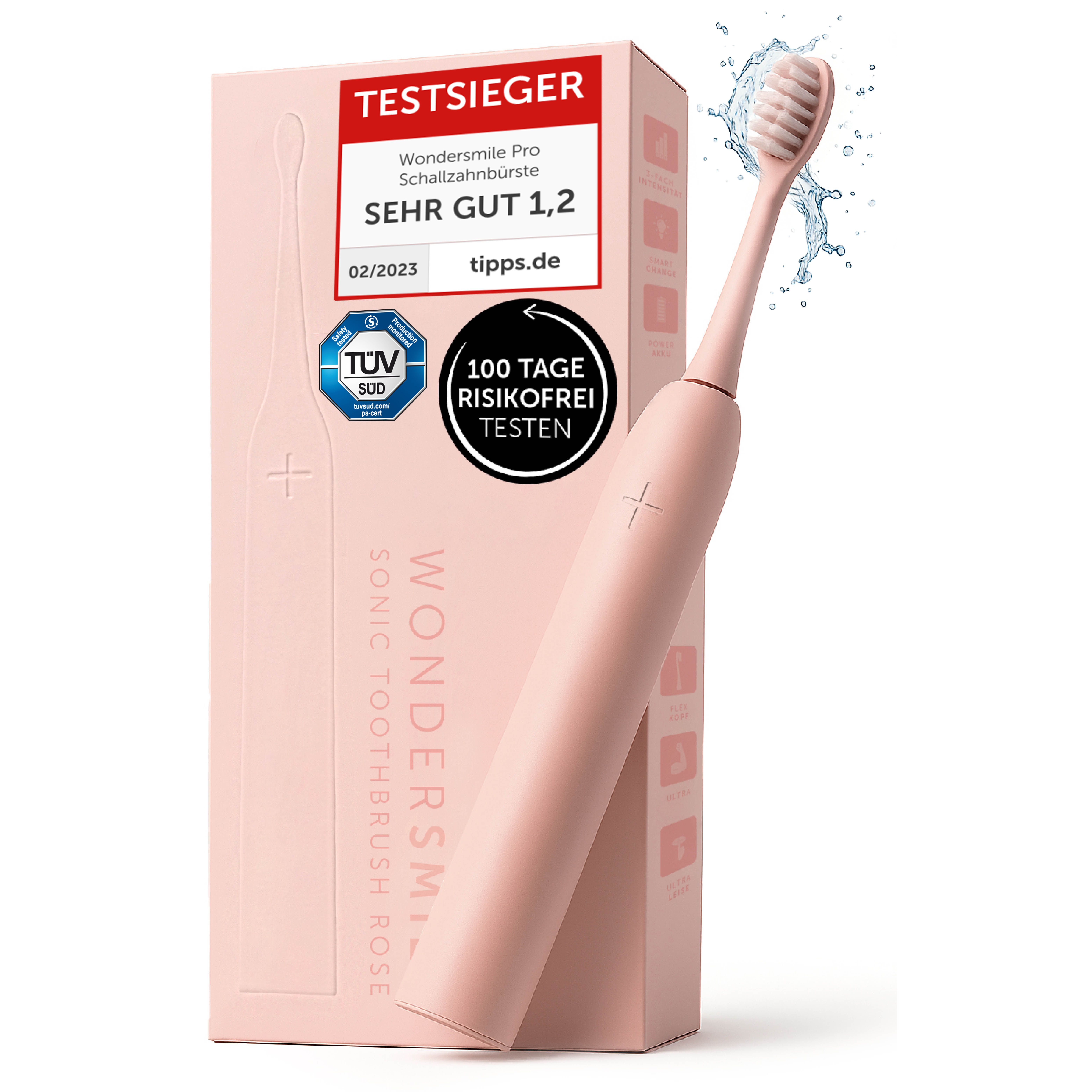 Rosa Schallzahnbürste Pro Atomic Rose mit Verpackung. Auf der Verpackung: Testsieger, TÜV-Siegel, 100 Tage risikofrei testen.