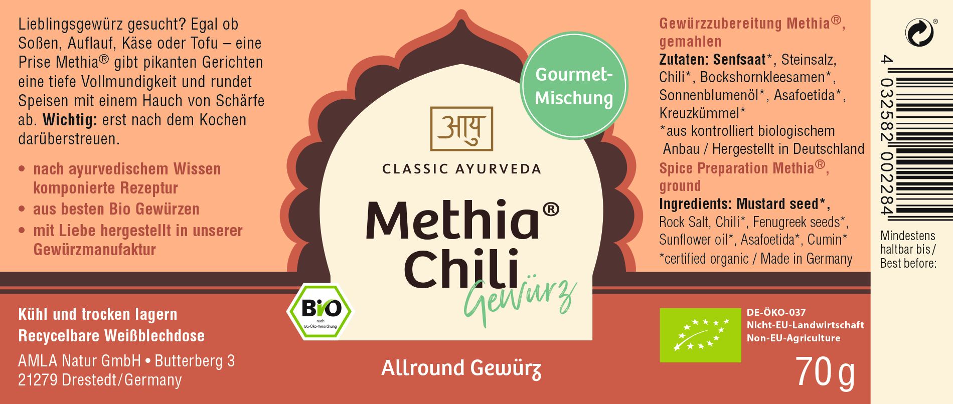Runde Dose mit Etikett. Aufschrift: Methia Chili Gewürz, Classic Ayurveda, Bio-Siegel. Text in Deutsch.