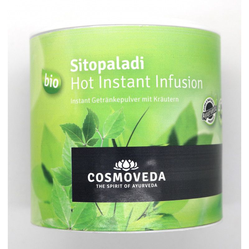 Zylindrische Dose mit grünem Etikett. Aufschrift: Sitopaladi, Hot Instant Infusion, Cosmoveda. Bio-Siegel.