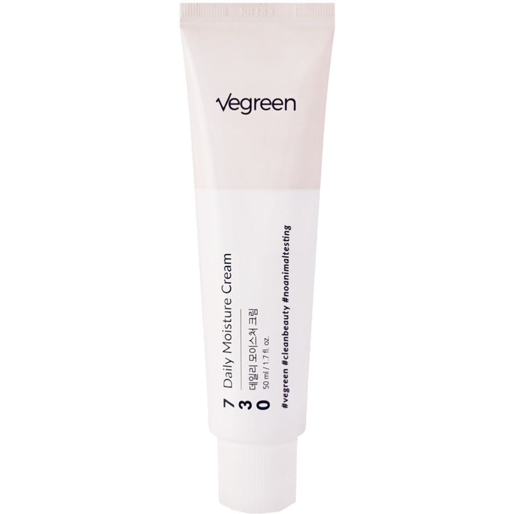 Creme-Tube mit Produktnamen und Text. Weiß und hellrosa. Aufschrift: VEGREEN 730 Daily Moisture Cream.