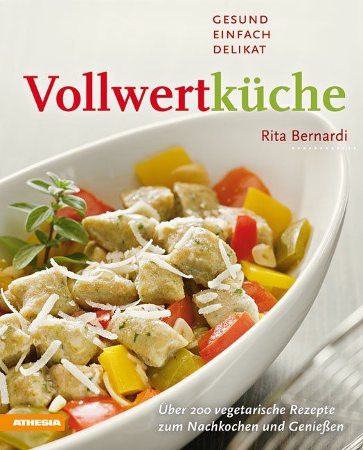 Buchcover: "Vollwertküche" mit Rezepten. Titel in Rot und Grün. Autorin: Rita Bernardi. Aufschrift: Gesund, einfach, delikat. Verlag: Athesia.
