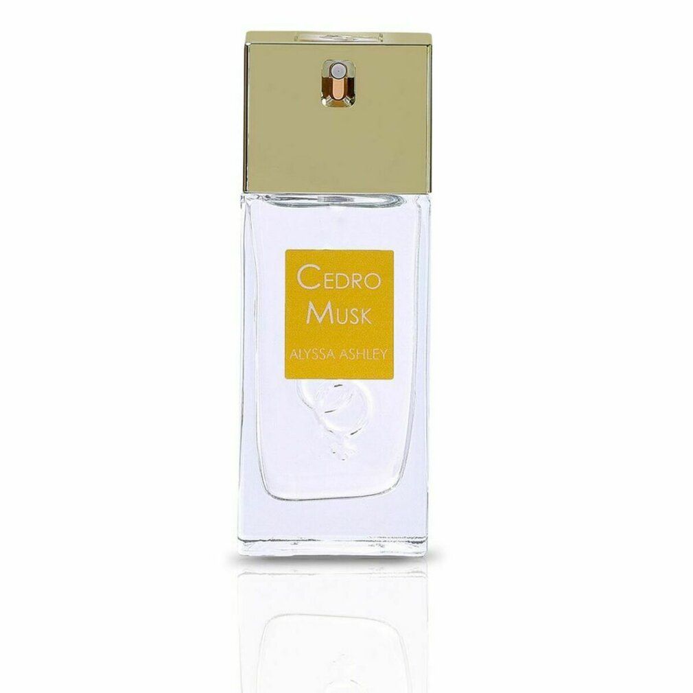 Rechteckiger Parfümflakon mit goldfarbenem Deckel. Aufkleber "Cedro Musk".