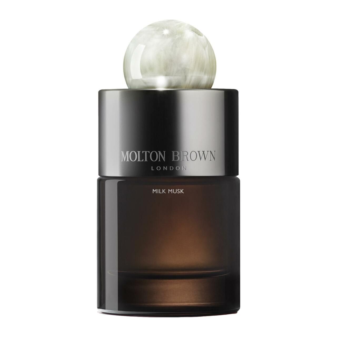 Flakon mit silbernem Deckel und Kugelverschluss. Aufschrift: Molton Brown, Milk Musk. Braunes Glas.