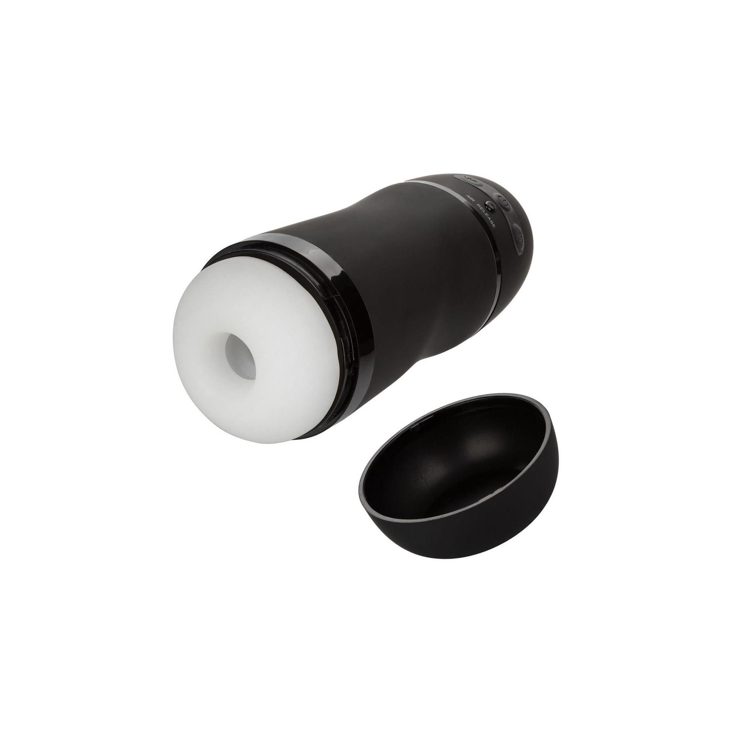 Schwarzes Gerät mit weißem Einsatz und abnehmbarem Deckel. Zylindrische Form.