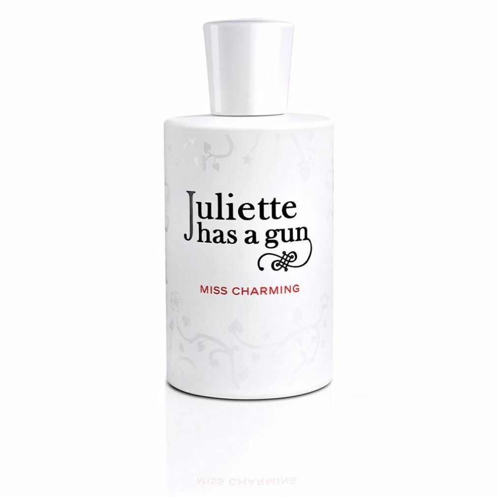 Weißes Parfümflakon mit weißem Verschluss. Auf dem Flakon steht "Juliette has a gun Miss Charming".