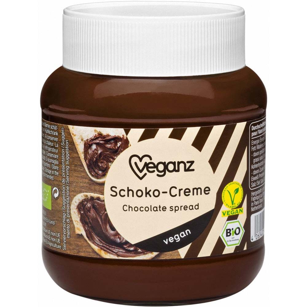 Glas mit Schoko-Creme. Weißer Deckel, braunes Glas. Aufkleber mit Logo, Produktname, „vegan“ und Bio-Siegel.
