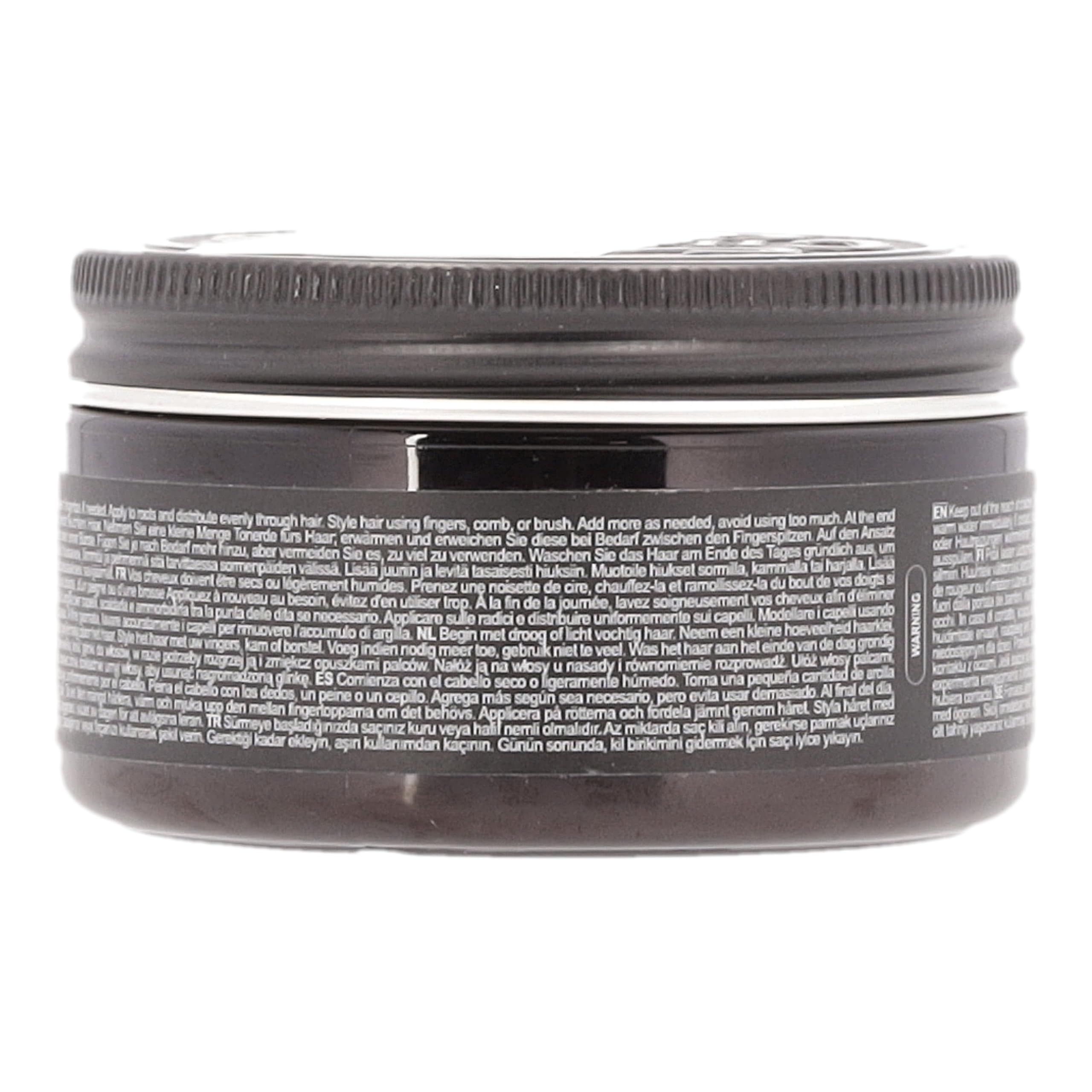 Schwarzer Deckel mit silbernem Schriftzug "CHARLE MAGN & PREMIUM GROOMING".