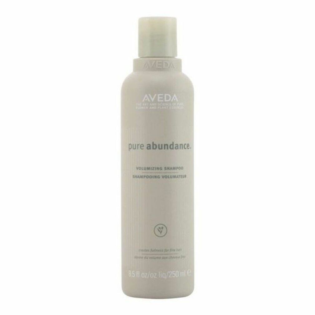 Beige Shampoo-Flasche mit weißem Deckel. Aufschrift: Aveda, Pure Abundance, volumizzante per capelli. 250ml.