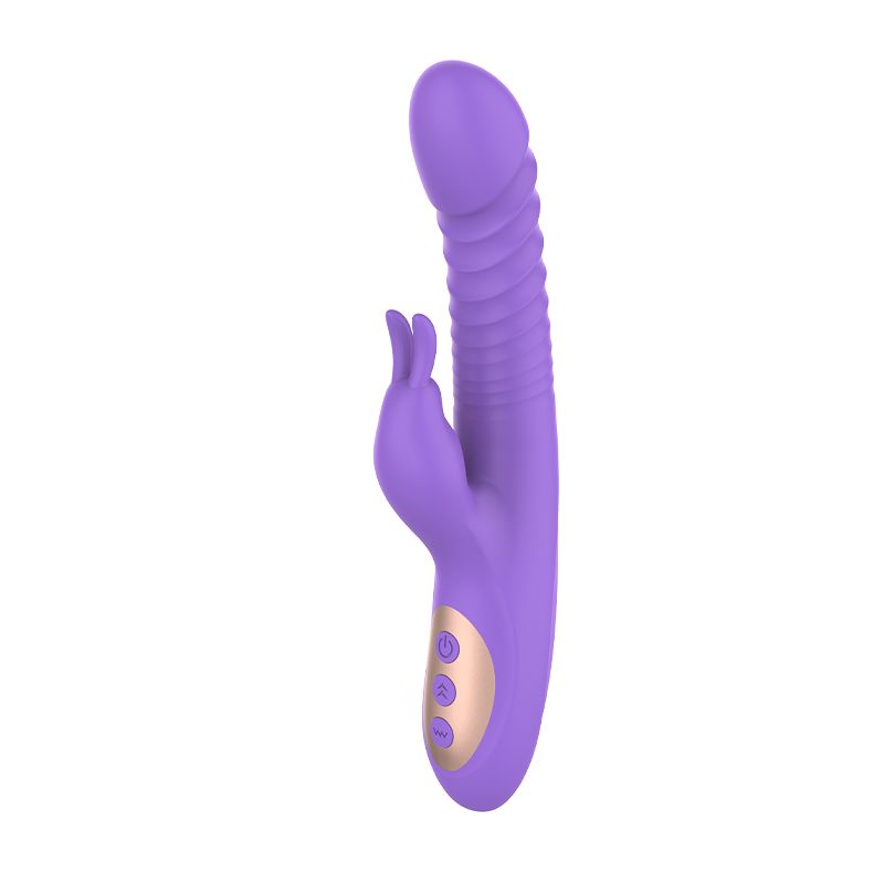 Lila Vibrator mit geriffelter Oberfläche und Hasenohren. Drei goldfarbene Knöpfe. 