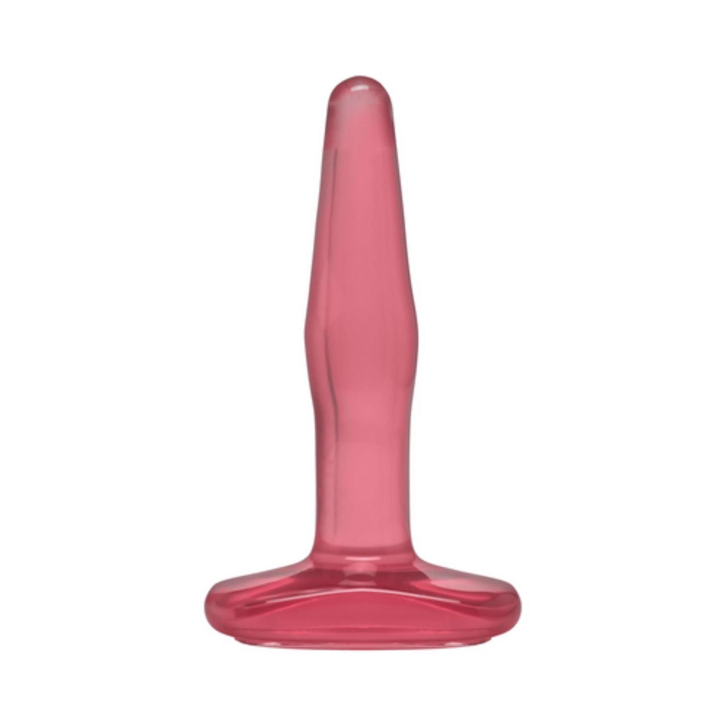 Rosa Butt Plug. Zylindrischer Schaft, breite Basis. Transparentes Material.