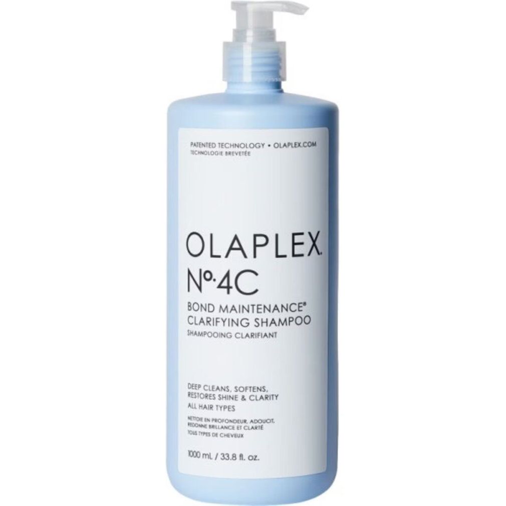 Hellblaues Shampoo mit Pumpe. Aufschrift: OLAPLEX Nº4C BOND MAINTENANCE Clarifying Shampoo. Tiefenreinigung, Glanz, für alle Haartypen.