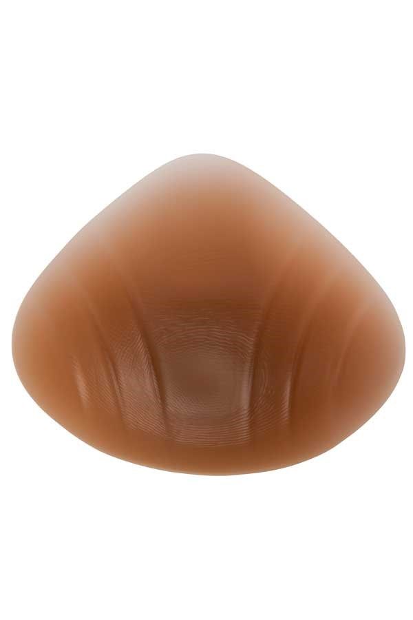 Brustprothese in Delta-Form. Beige, tropfenförmig. Mit leicht gewölbter Oberfläche.