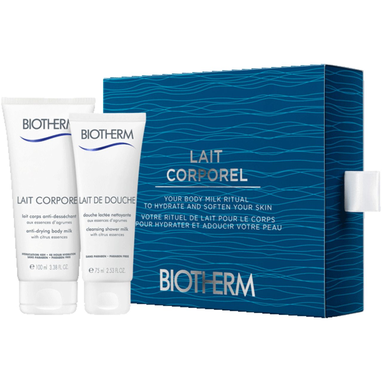 Biotherm Verwöhnset. Zwei Tuben und eine blaue Schachtel mit Wellenmuster. Text: Lait Corporel, Lait de Douche. Marke: Biotherm.
