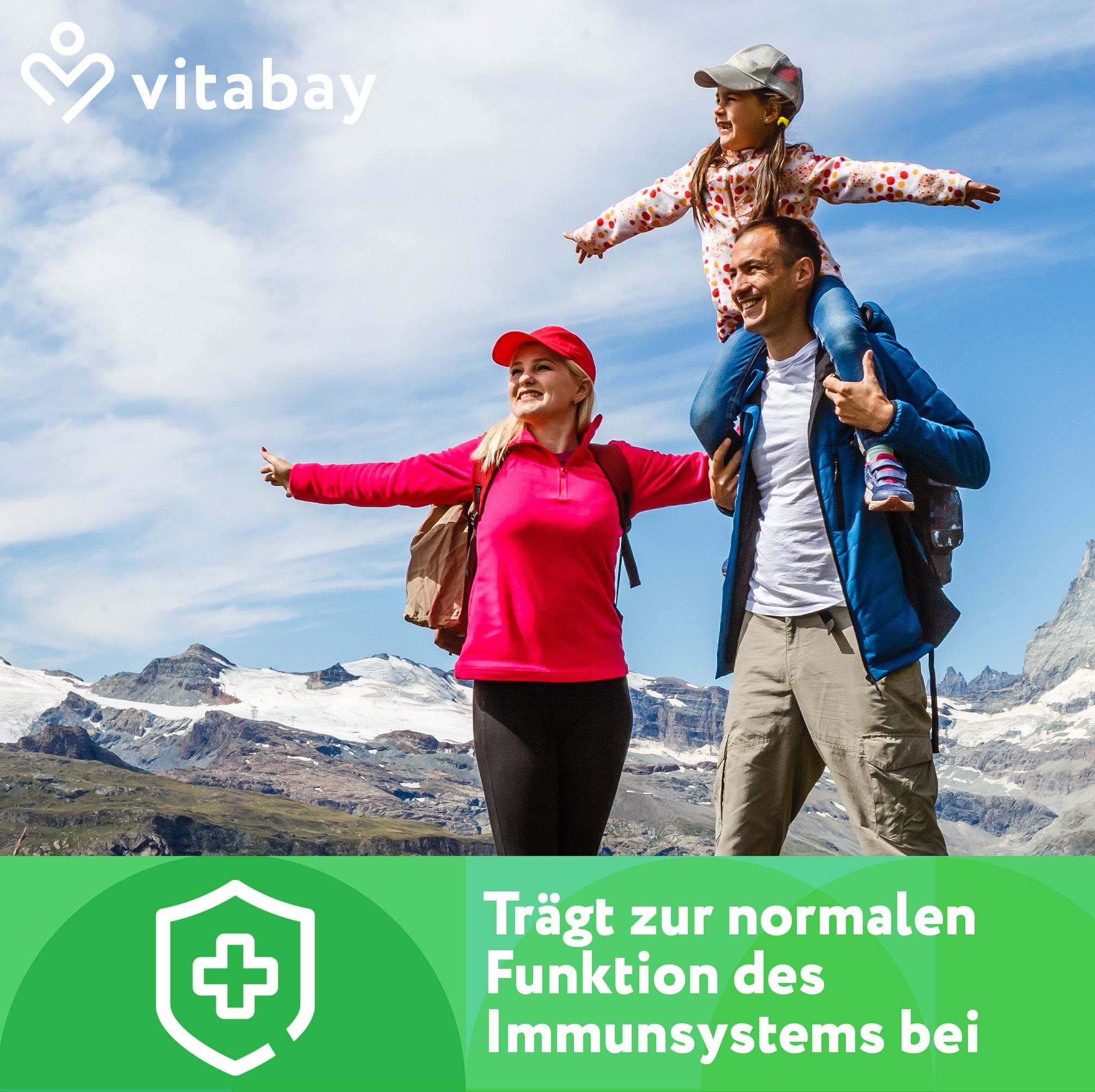 Familie wandert. Text: Trägt zur normalen Funktion des Immunsystems bei. Grüner Hintergrund mit Kreuz.