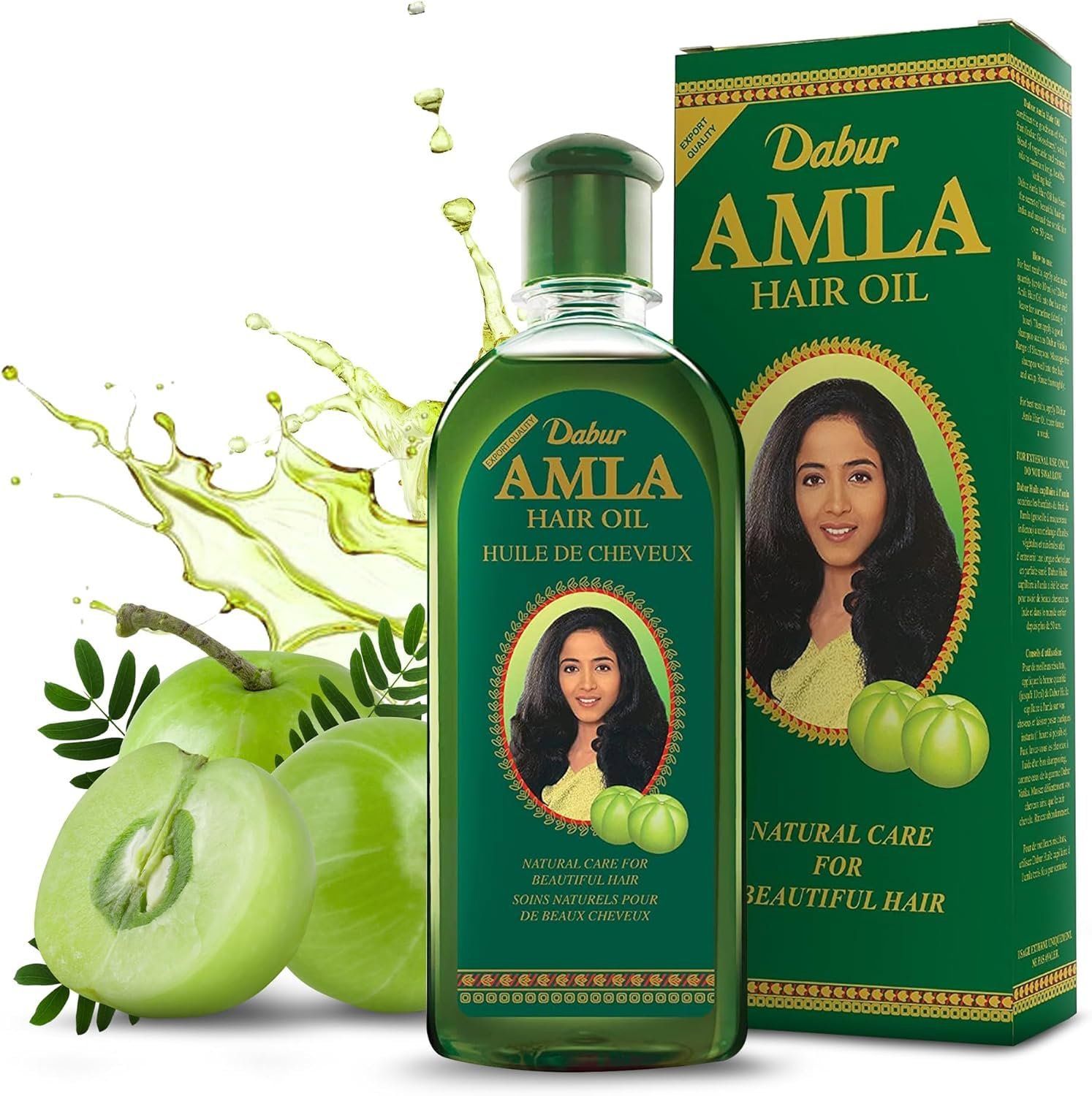 Grüne Flasche und Karton mit Dabur Amla Haaröl. Abgebildet sind auch grüne Früchte und ein Spritzer Öl.