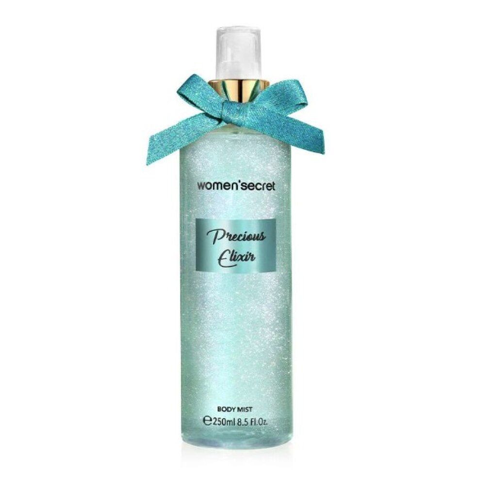 Body Mist Precious Elixir von Women's Secret in einem durchsichtigen Flakon mit türkisfarbenem Band und Schleife. Enthält Glitzerpartikel.