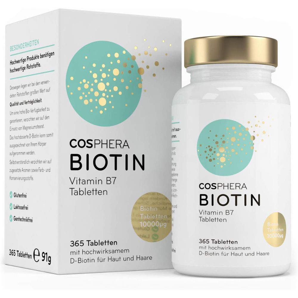 Weiße Flasche mit goldfarbenem Deckel und Etikett. Aufschrift: Cosphera Biotin Vitamin B7 Tabletten. Daneben eine weiße Schachtel mit ähnlichem Design.