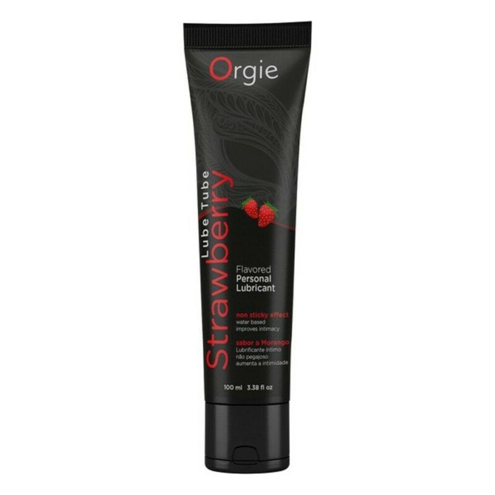 Schwarze Tube mit roter Aufschrift "Strawberry" und "Orgie". Erdbeer-Abbildung. Text: "Flavored Personal Lubricant".