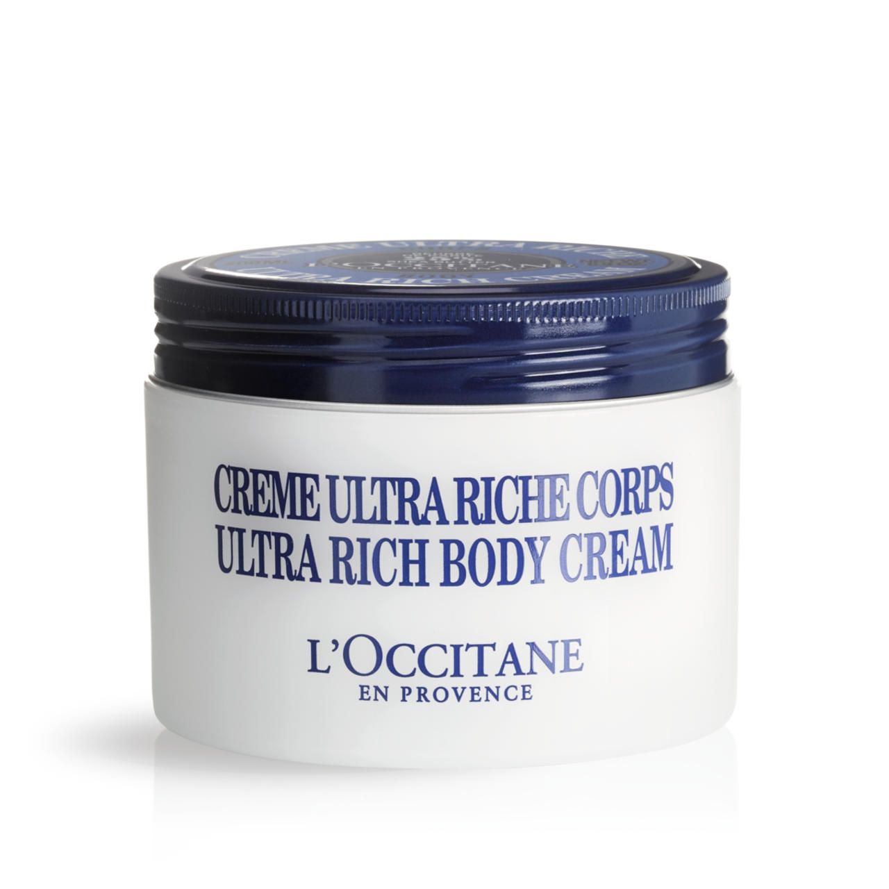 Weißer Tiegel mit blauem Deckel. Aufschrift: Crème Ultra Riche Corps, L'Occitane. Produktname.