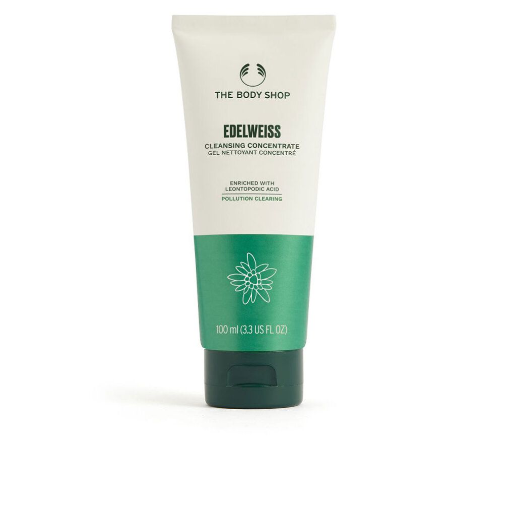 Tube "THE BODY SHOP EDELWEISS Cleansing Concentrate". Grün-weißes Design, floraler Aufdruck, Text in Englisch und Französisch. 100 ml.
