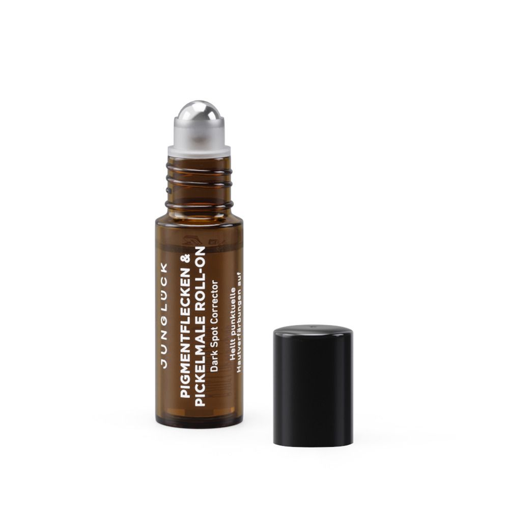 Braune Roll-On-Flasche mit silberner Kugel und schwarzem Deckel. Beschriftung: JUNGLÜCK Pigmentflecken & Pickelmale Roll-On.