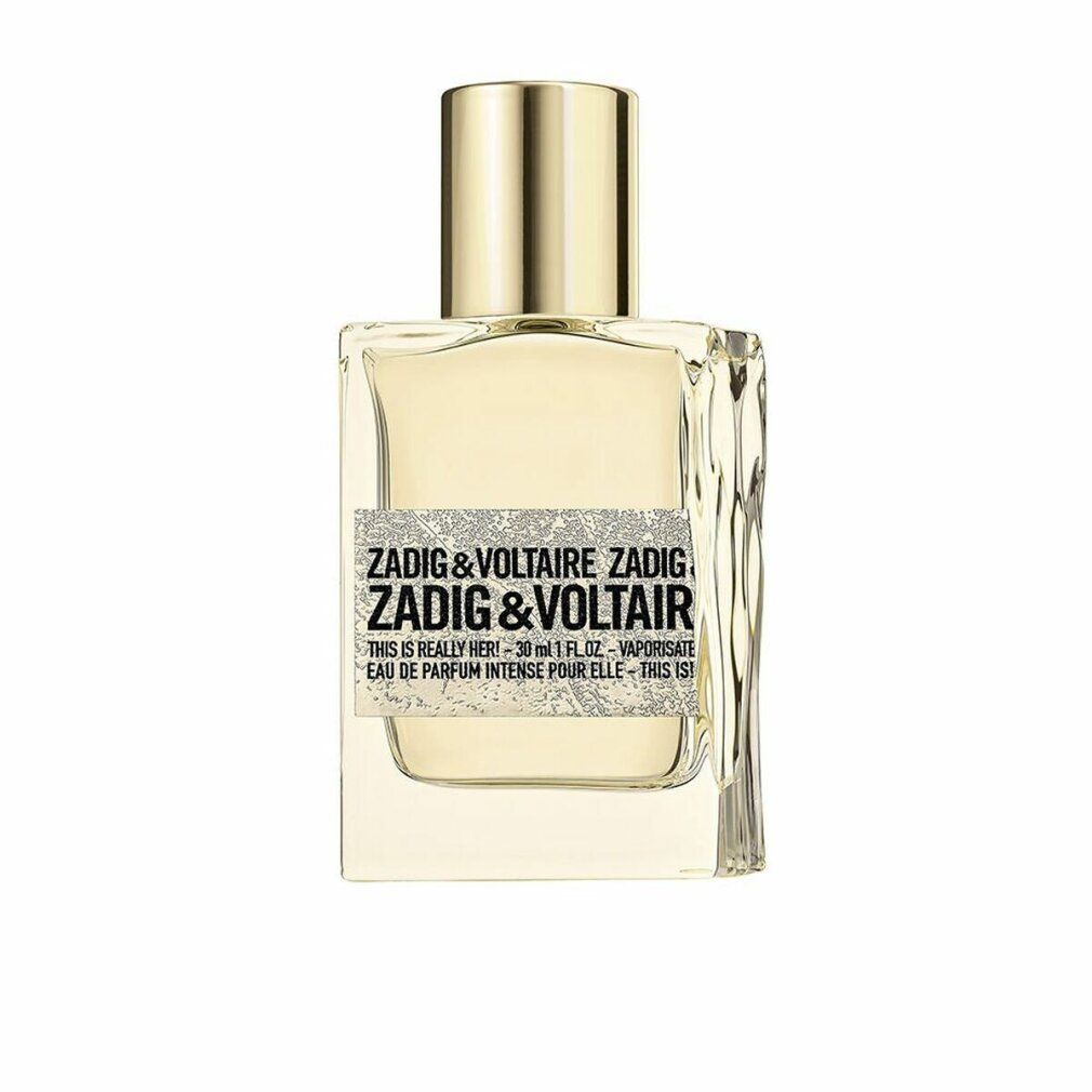 Zadig & Voltaire Duftflakon. Rechteckige Form, goldfarbener Verschluss. Aufschrift: Zadig & Voltaire, This Is Really Her! EdP Intense.
