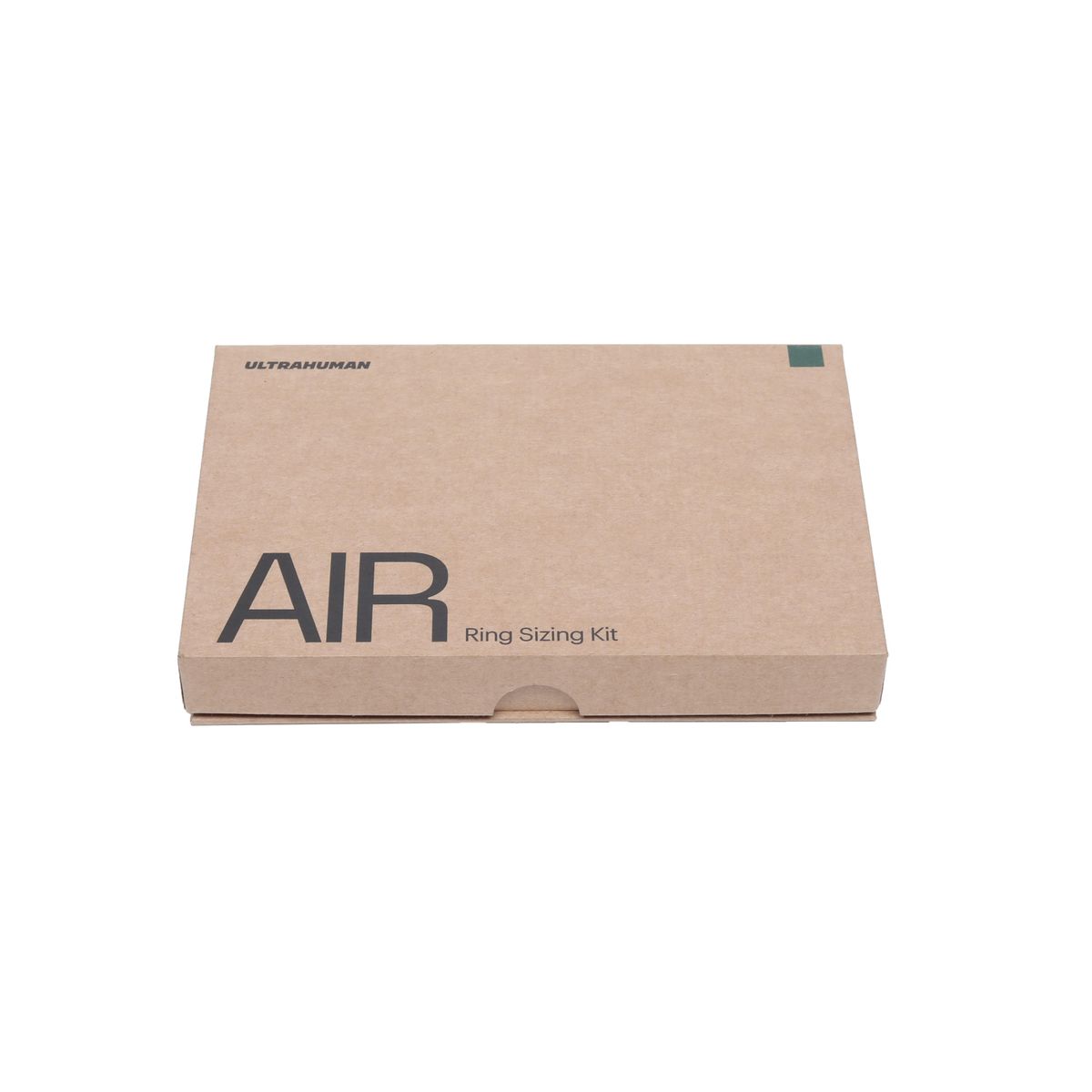 Geschlossene Pappschachtel. Aufdruck: Ultrahuman AIR Ring Sizing Kit. Kleiner grüner Akzent.