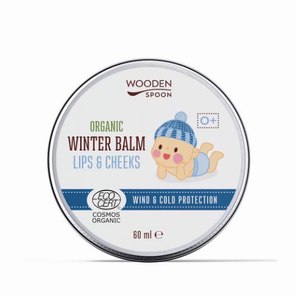 Runde Dose mit Deckel. Aufschrift: Wooden Spoon, Organic Winter Balm Lips & Cheeks. Baby-Illustration. Eco Cert Cosmos Organic.