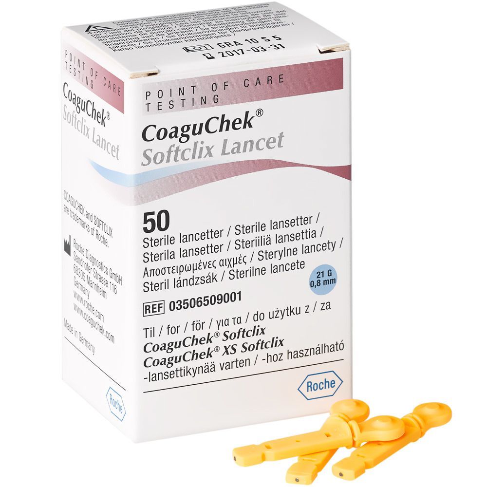 Packung CoaguChek Softclix Lancet mit 50 sterilen Lanzetten. Gelbe Lanzetten liegen daneben. 21G, 0,8 mm.