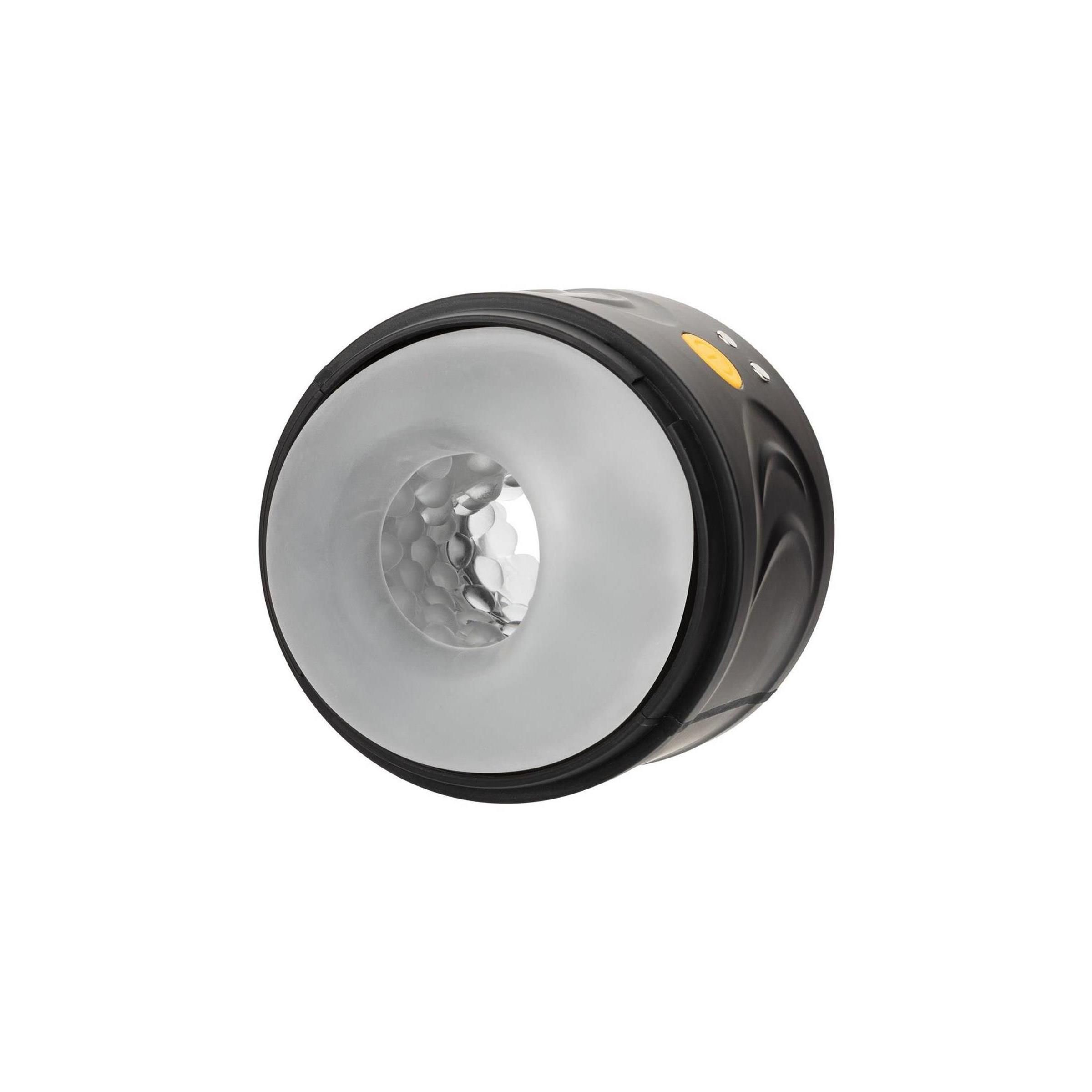 Schwarzes Gerät mit weißem Innenraum. Gelber Knopf und zwei kleine Knöpfe. Geformt für Intimität.