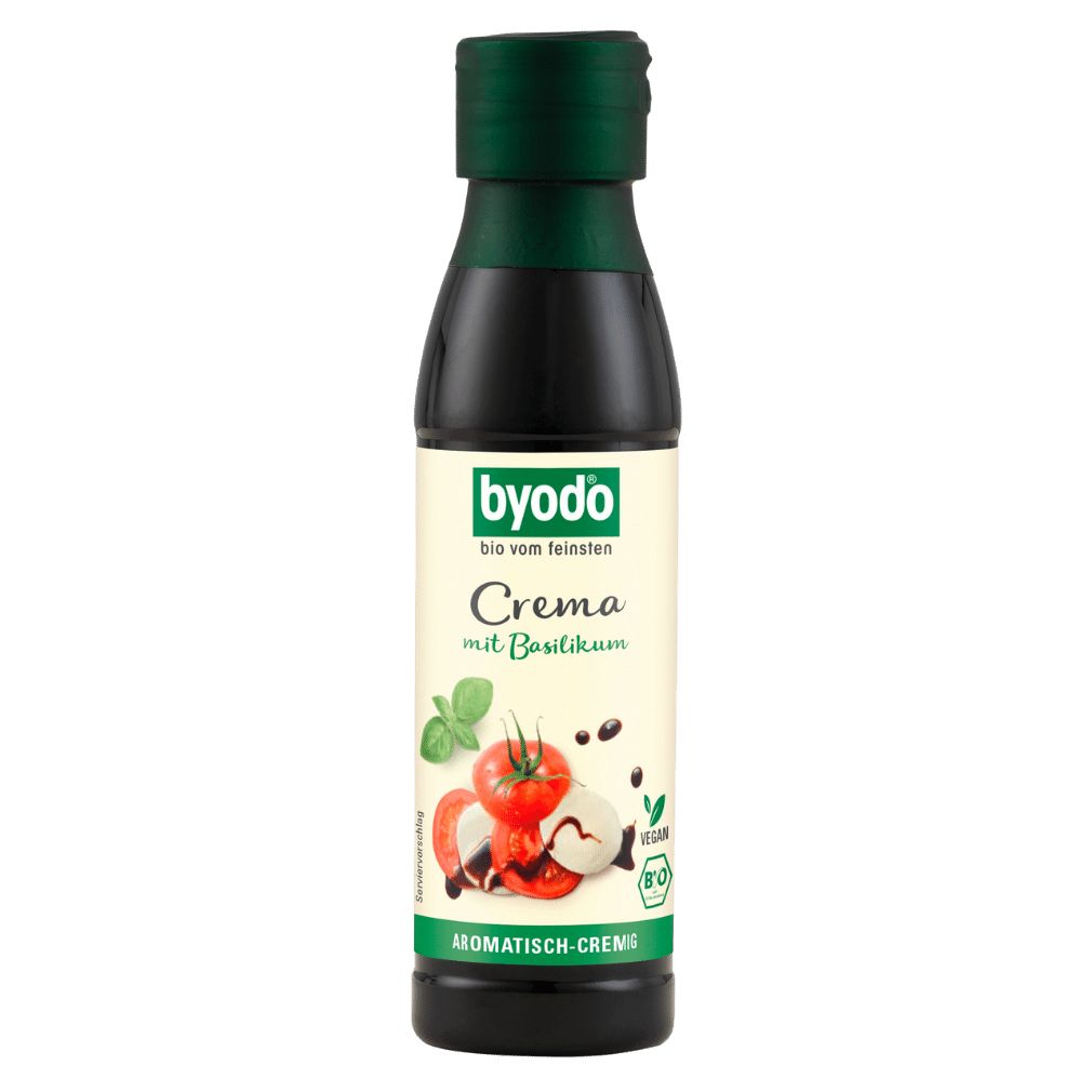 Flasche mit grünem Deckel. Etikett mit "byodo", "Crema mit Basilikum", Tomaten, Basilikumblatt und Bio-Siegel.