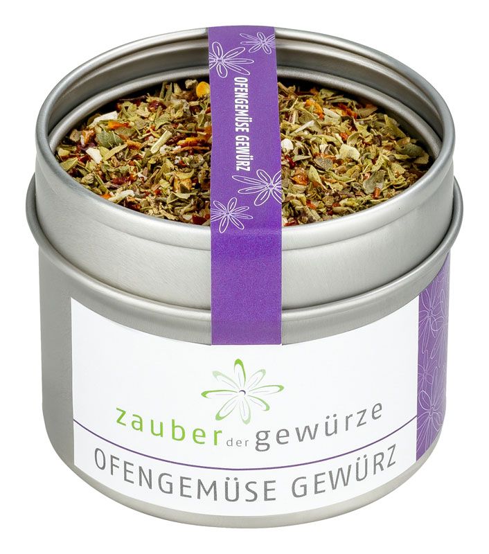 Runde Metallbox mit Gewürzmischung. Aufkleber mit Produktnamen und lila Band mit Aufschrift. Deckel offen.