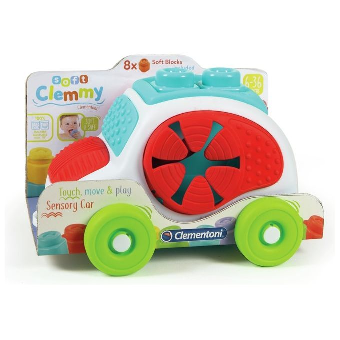 Spielzeugauto mit bunten Elementen und weichen Blöcken. Verpackung mit Produktname und Logo.