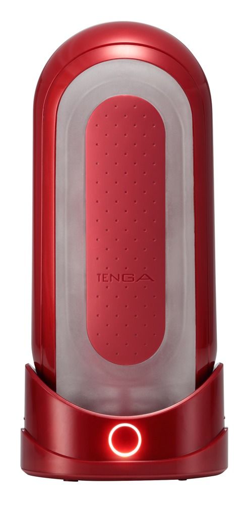 Roter TENGA Flip 0. Zylindrische Form mit roter Innenfläche und transparentem Gehäuse. Mit beleuchtetem Sockel.