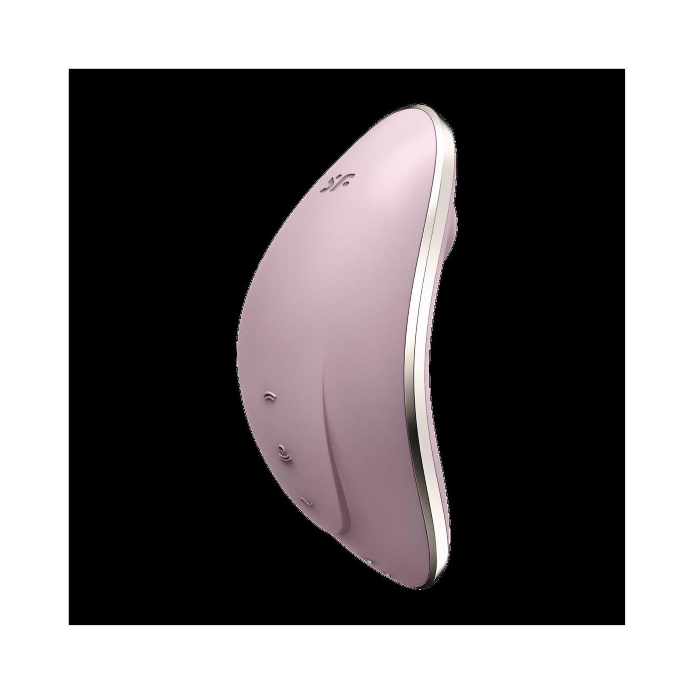 Rosa Vibrator mit silberfarbener Umrandung. Drei Knöpfe. Auf schwarzem Hintergrund.