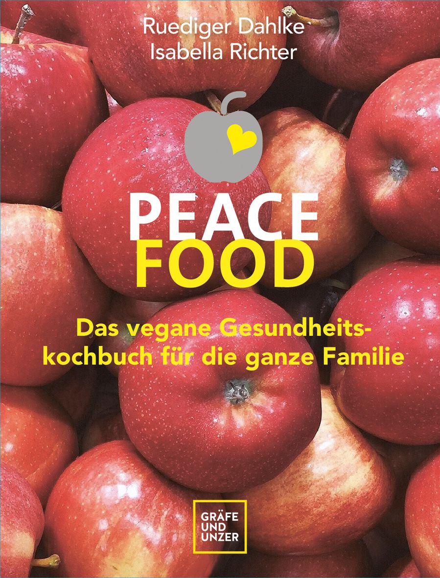 Buchcover mit Äpfeln. Titel: PEACE FOOD. Untertitel: Das vegane Gesundheitskochbuch für die ganze Familie. Autoren: Ruediger Dahlke, Isabella Richter.