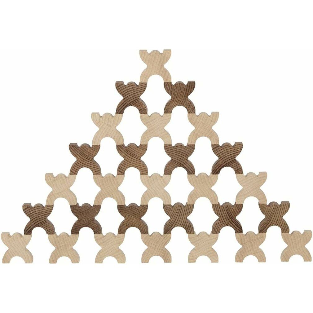 Holzfiguren, hell und dunkelbraun, pyramidenförmig gestapelt. Figuren mit X-Form, für ein Balance-Spiel.