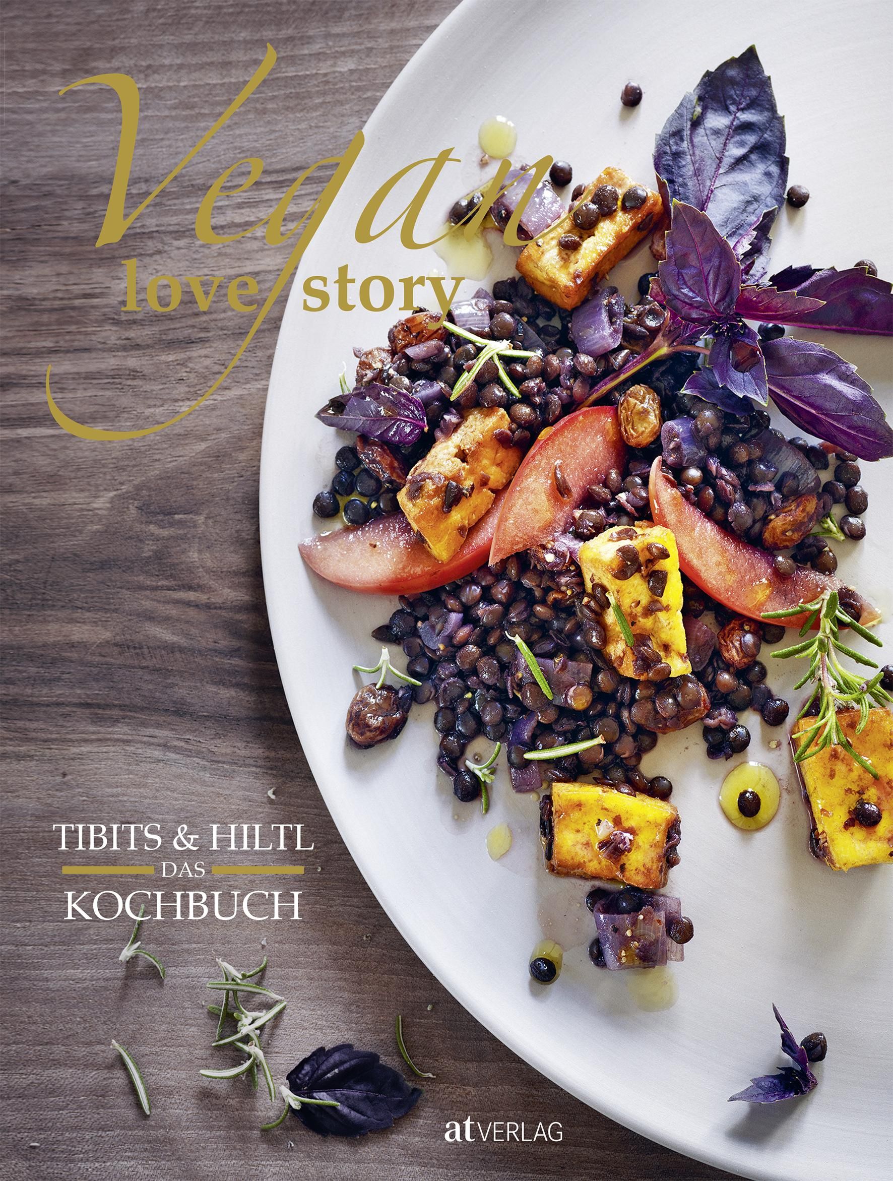 Kochbuch-Cover mit dem Titel "Vegan Love Story". Auf einem Teller angerichtetes Essen. Unten steht "Tibits & Hiltl Das Kochbuch".