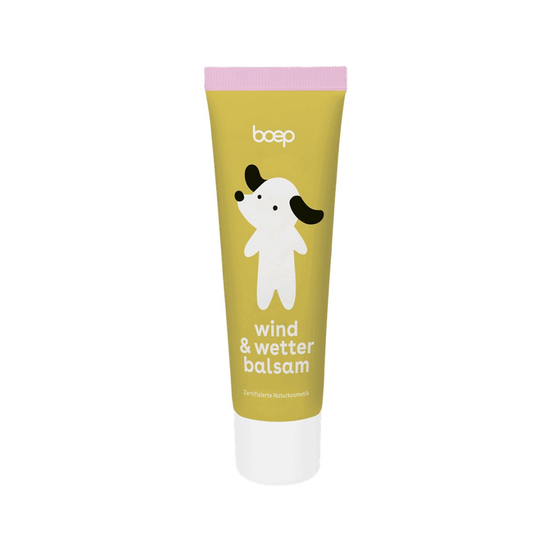 Gelbe Tube mit weißem Aufdruck: boep Wind & Wetter Balsam mit Hund-Illustration. Rosa Verschluss.