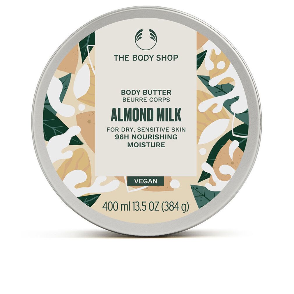 Runder Behälter mit Deckel. Aufschrift: Almond Milk Body Butter. Für trockene, empfindliche Haut. Vegan. 400 ml.