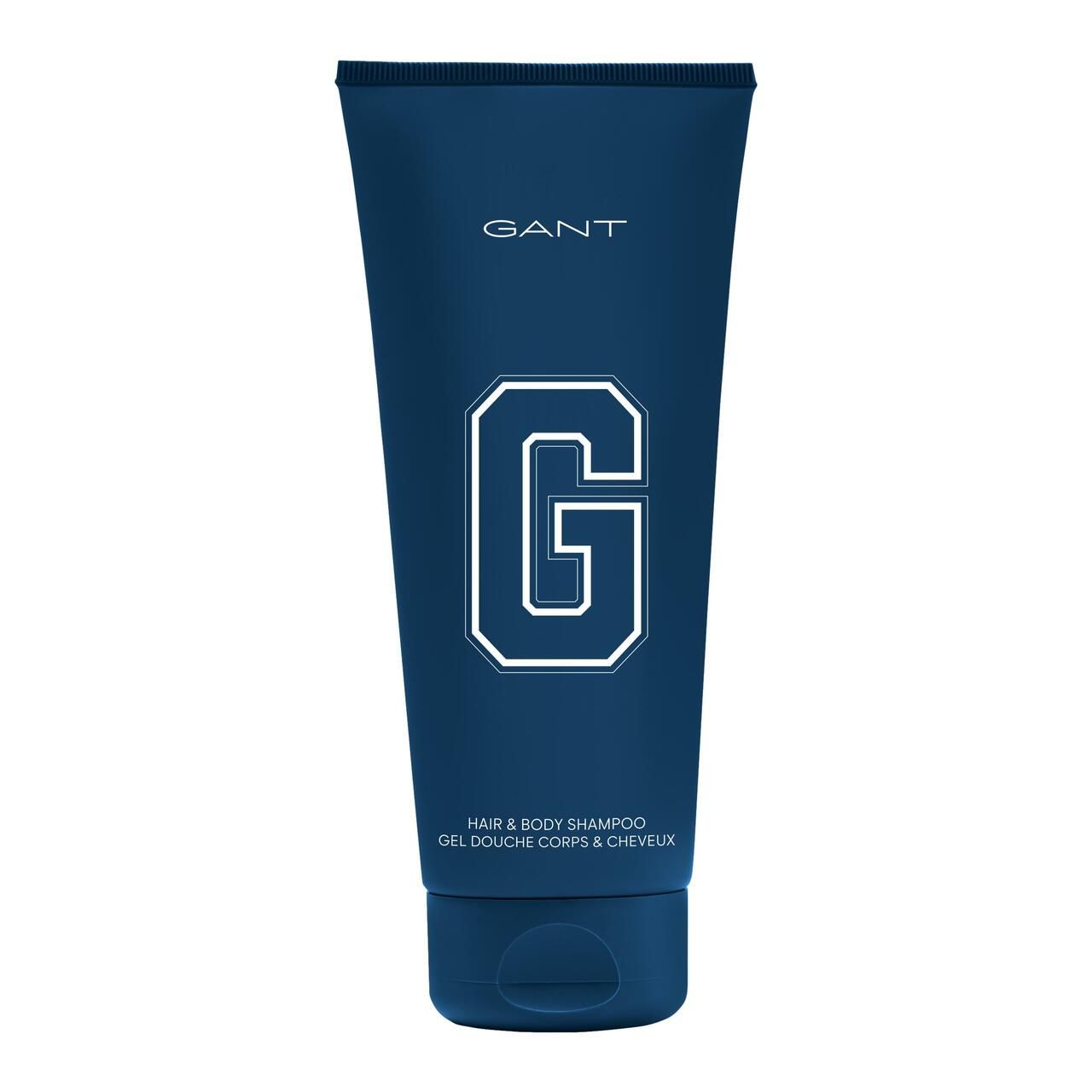 Blaue Shampoo-Tube mit weißem "G" und GANT-Logo. Text: Hair & Body Shampoo, Gel Douche Corps & Cheveux.