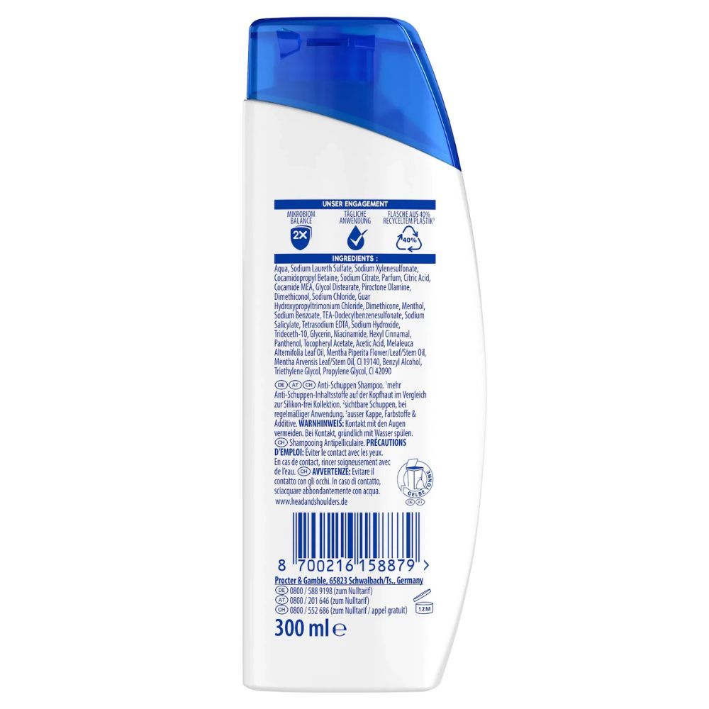 Dos du flacon de shampooing. Ingrédients, symbole de recyclage, informations fabricant, 300 ml.