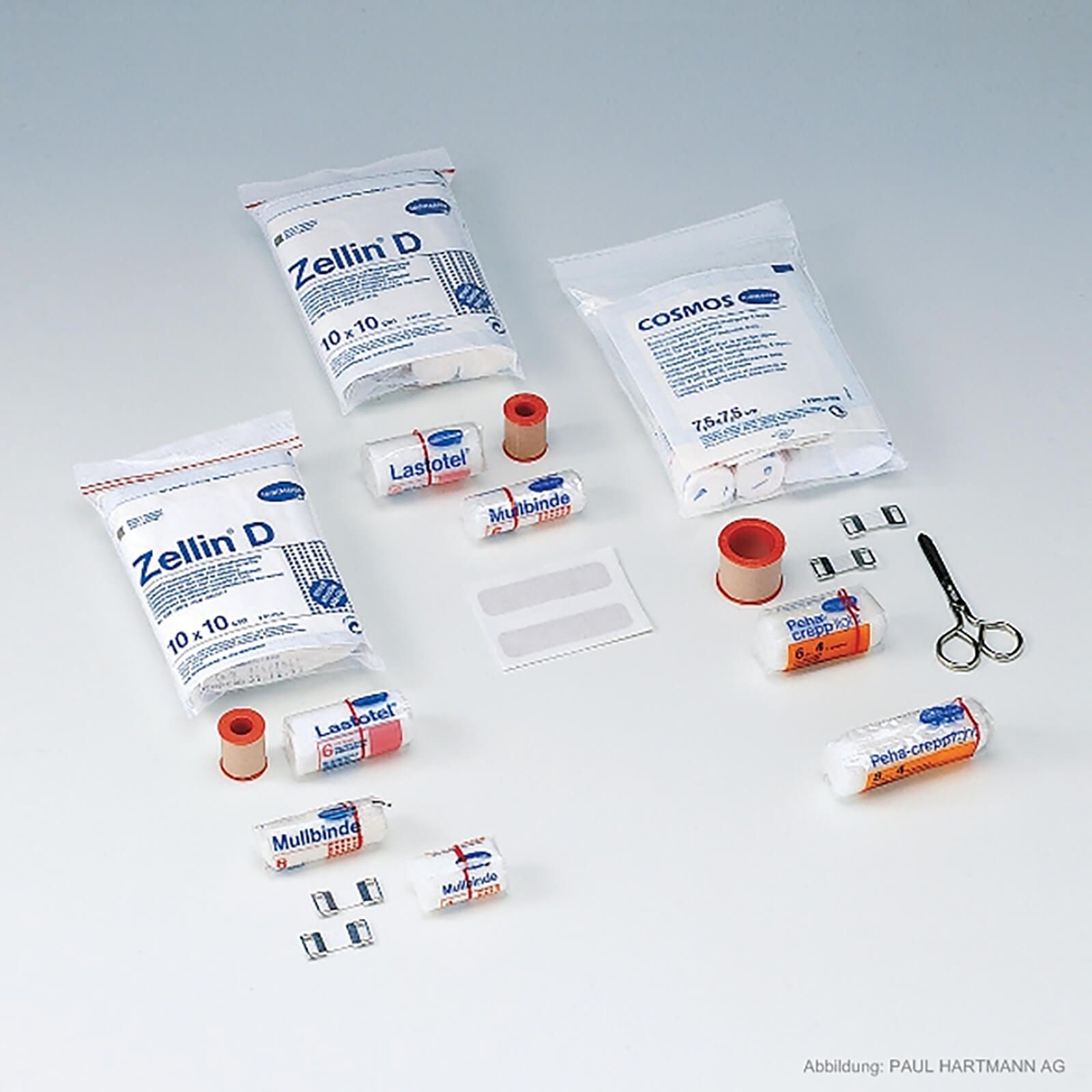 Verbandmaterial-Set. Enthält Zellin D, Lastotel, Mullbinde, Cosmos, Peha-crepe, Pflaster, Klammern, Schere und Rollenverband.