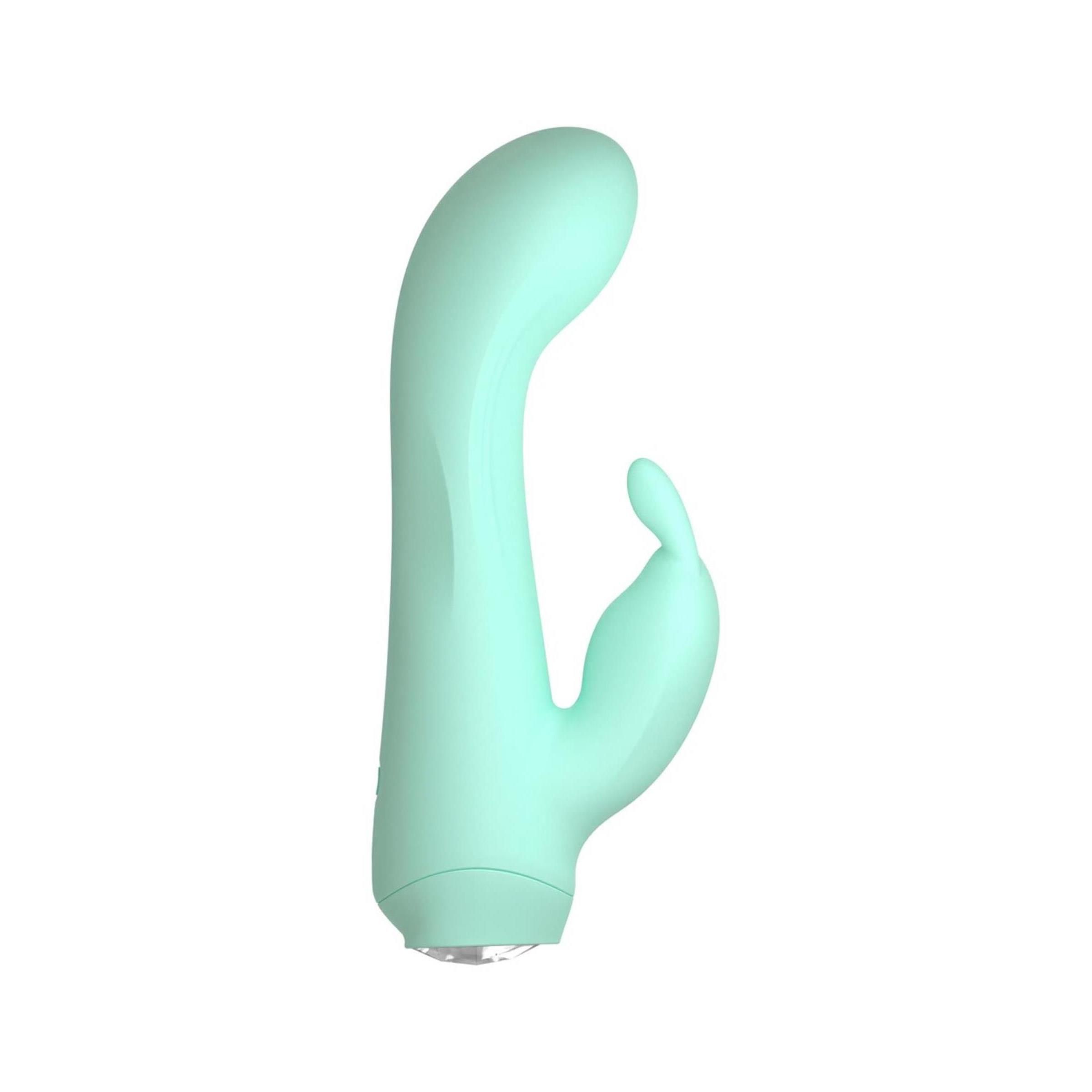Minivibrator in Mintgrün. Gebogene Form mit einem abgerundeten Ende und einem kleineren, fingerförmigen Vorsprung.