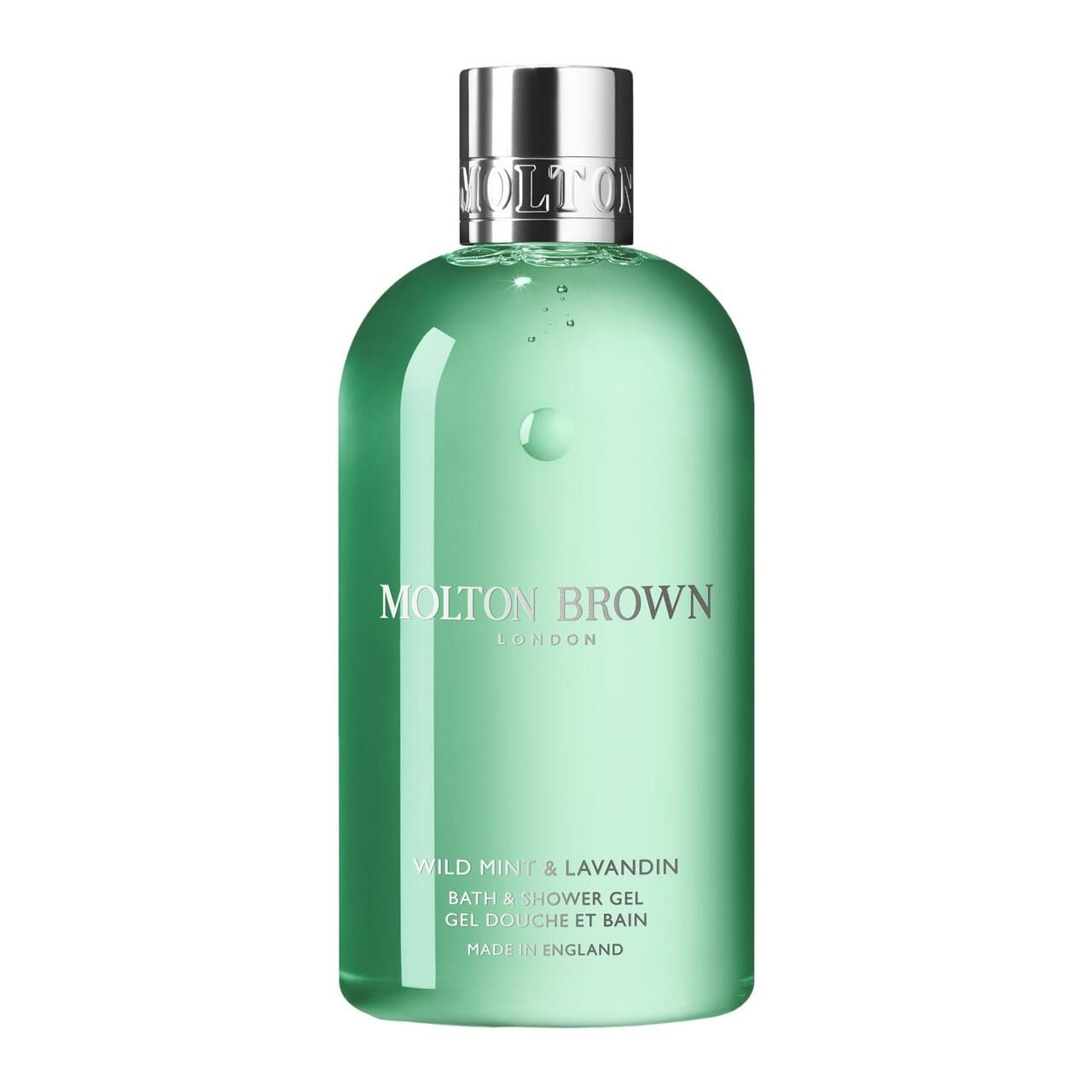 Grüne Flasche mit silbernem Deckel. Aufschrift: Molton Brown, Wild Mint & Lavandin, Bath & Shower Gel. Hergestellt in England.